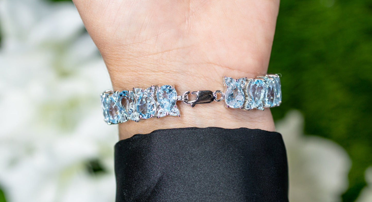 Blue Topaz Tennis Bracelet 58 Carats Rhodium Plated Sterling Silver