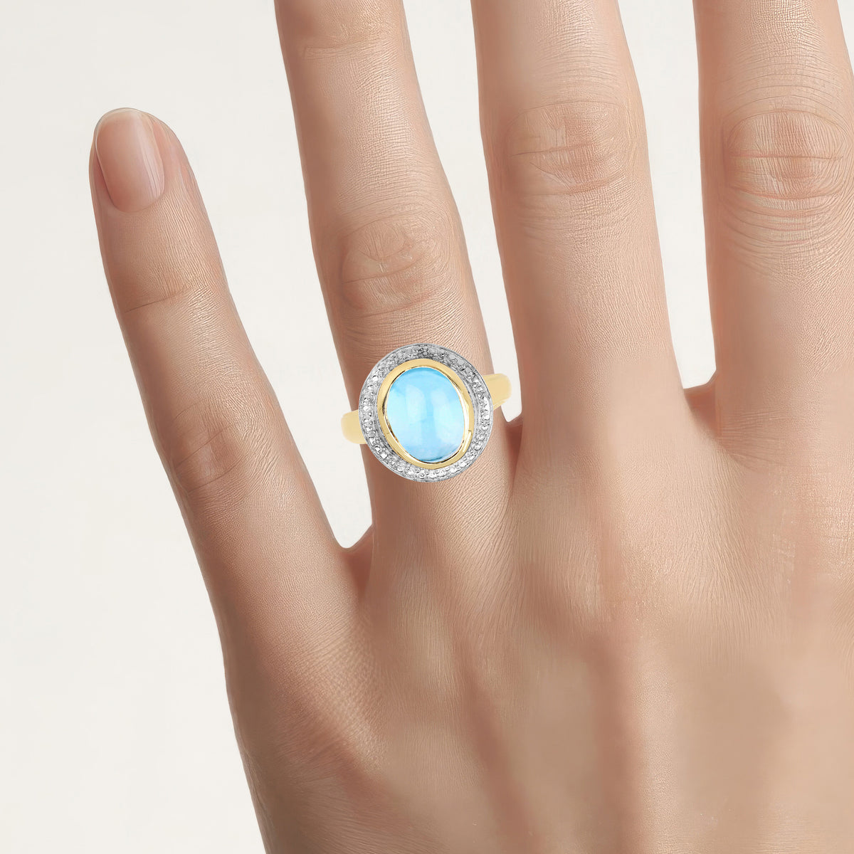 Blue Topaz Ring 6.68 Carats Gold Plated Silver