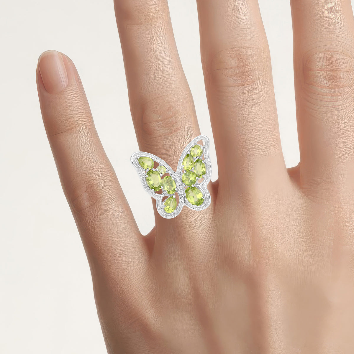 Peridot Butterfly Ring With White Topaz 4.47 Carats Sterling Silver
