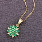 Zambian Emerald Flower Pendant With Diamonds 0.68 Carats 14K Yellow Gold
