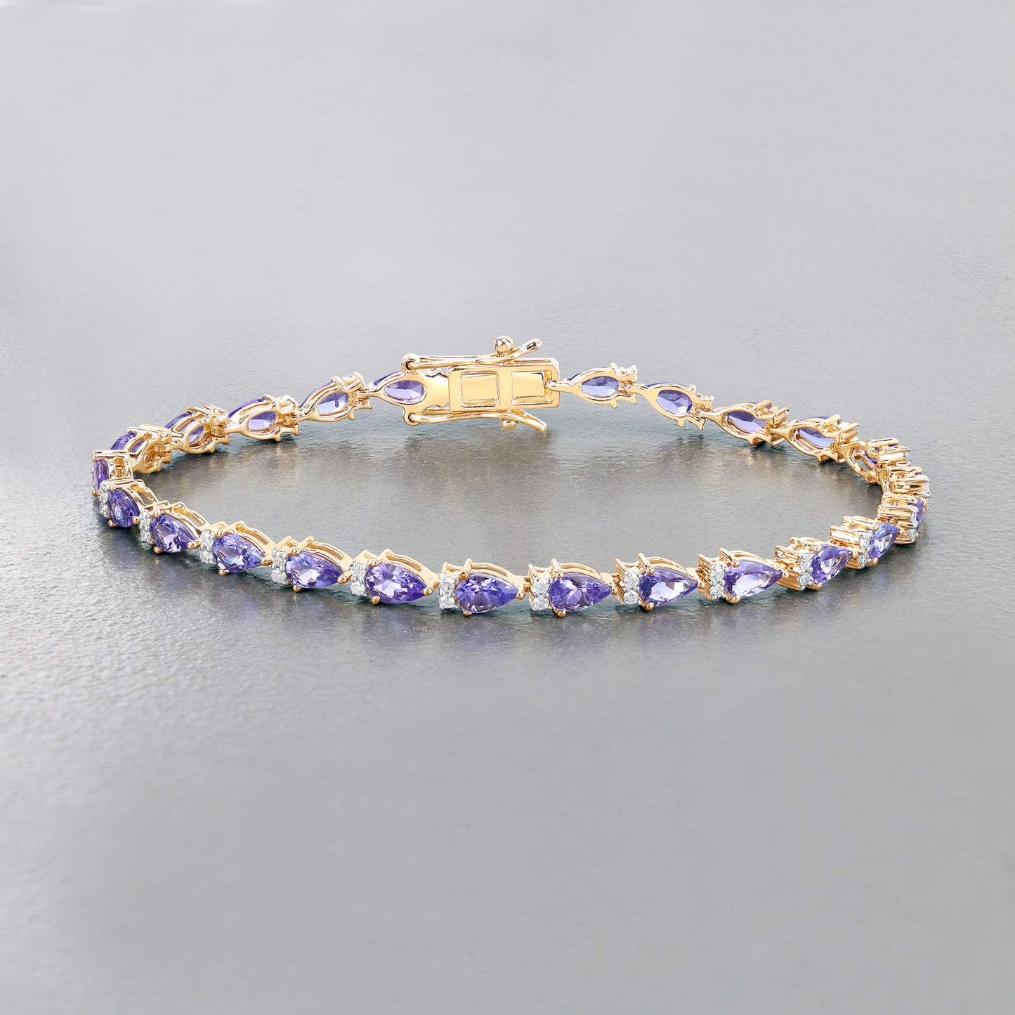 Natural Tanzanite Bracelet With Diamonds 5.62 Carats 14K Yellow Gold
