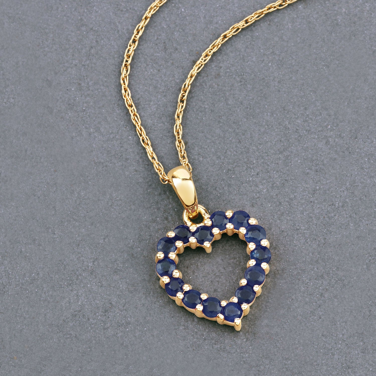 Natural Sapphire Heart Pendant 0.62 Carats 10K Yellow Gold