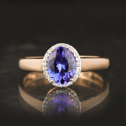 Natural Tanzanite Ring With White Zircon 1.28 Carats 9K Yellow Gold