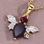 Garnet Bat Pendant With White Topaz 1.55 Carats Gold Plated Silver