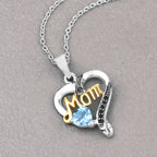 Swiss Blue Topaz Mom Pendant With Black Spinel 0.54 Carats Gold Plated Silver