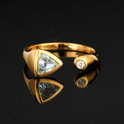 Sky Blue Topaz Ring With White Zircon 0.75 Carats Gold Plated Silver