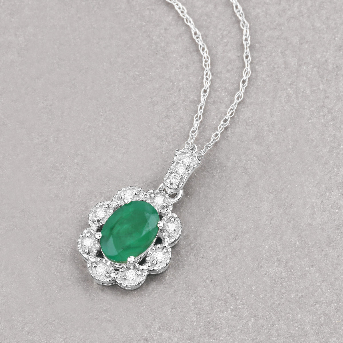 Zambian Emerald Pendant With Diamonds 0.76 Carats 10K White Gold