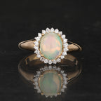 Natural Ethiopian Opal Ring With Diamonds 1.22 Carats 9K Yellow Gold