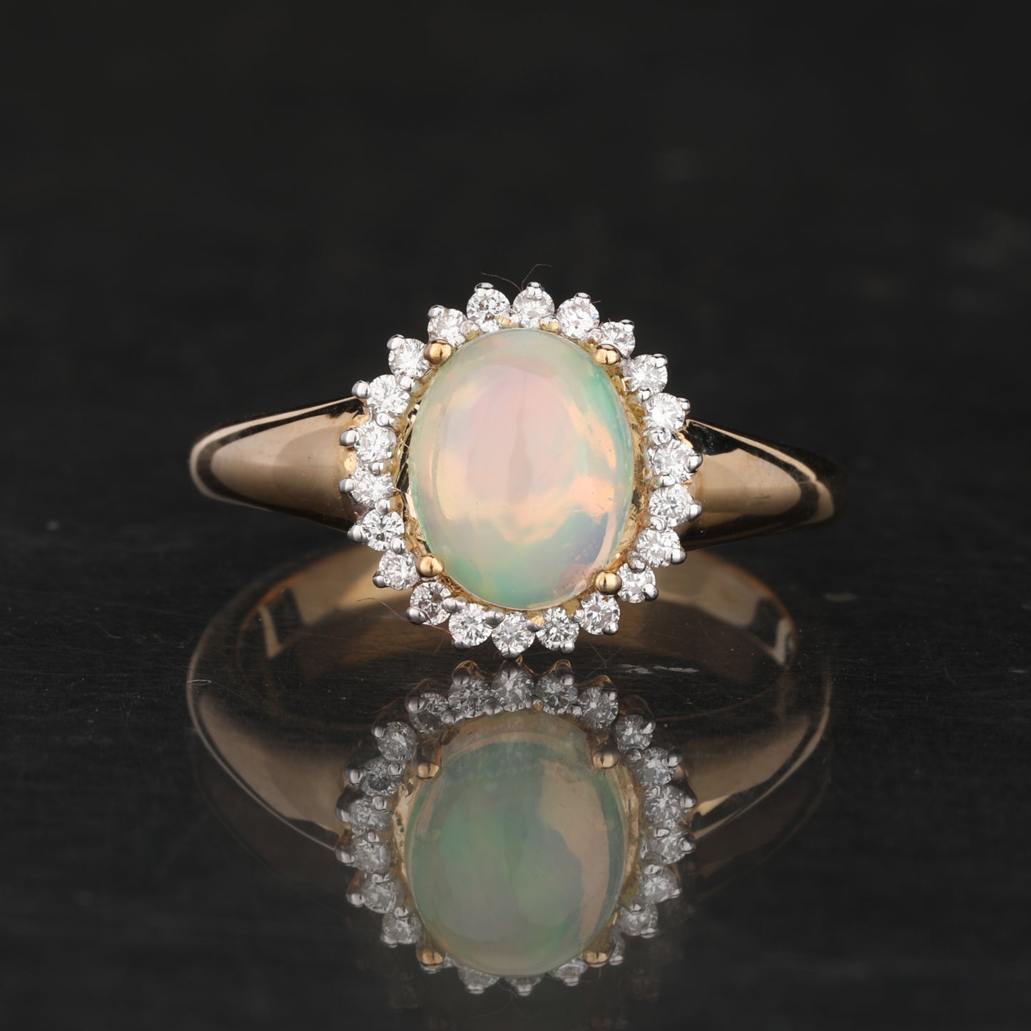 Natural Ethiopian Opal Ring With Diamonds 1.22 Carats 9K Yellow Gold
