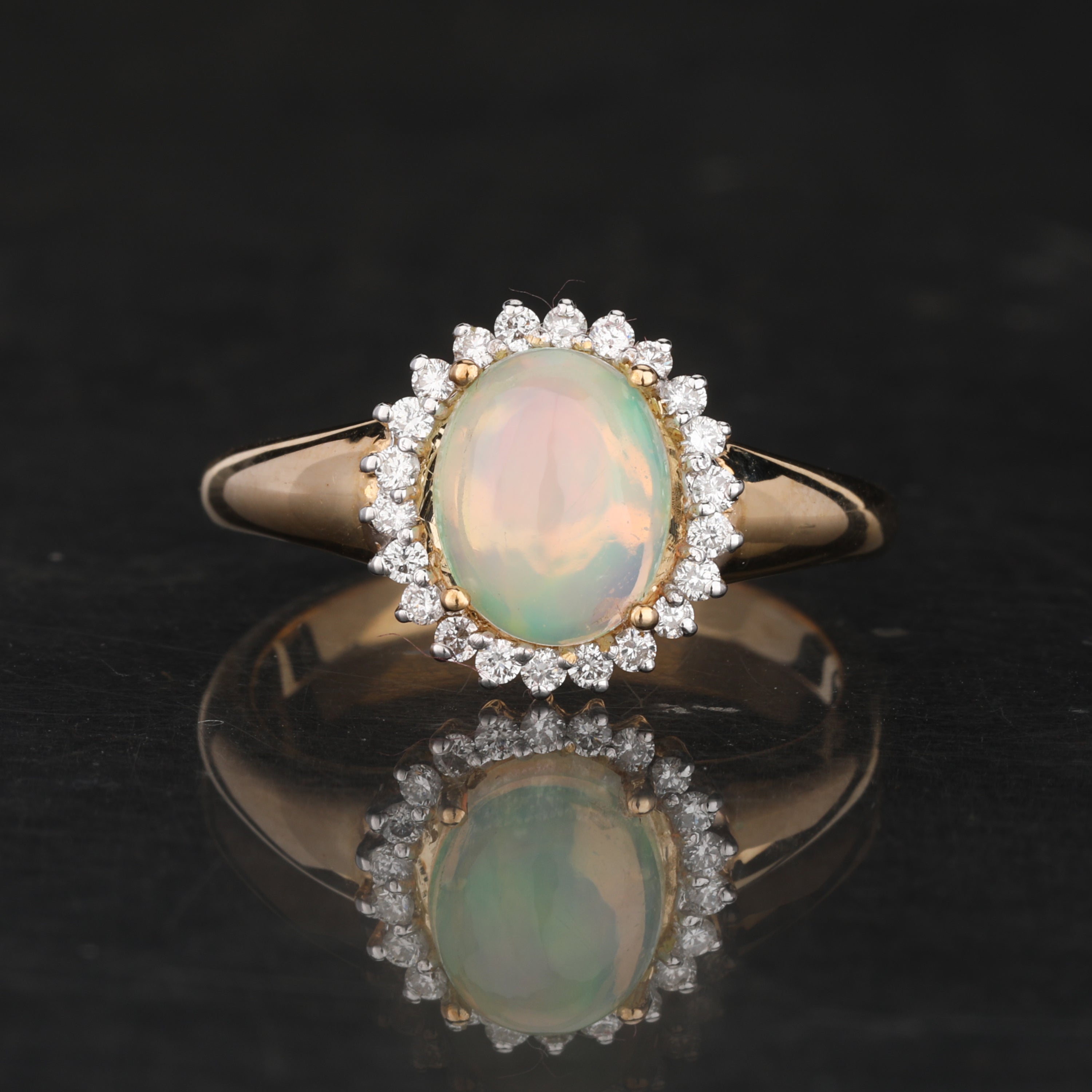 Natural Ethiopian Opal Ring With Diamonds 1.22 Carats 9K Yellow Gold