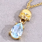 Blue Topaz Skull Pendant 0.84 Carats Gold Plated Silver