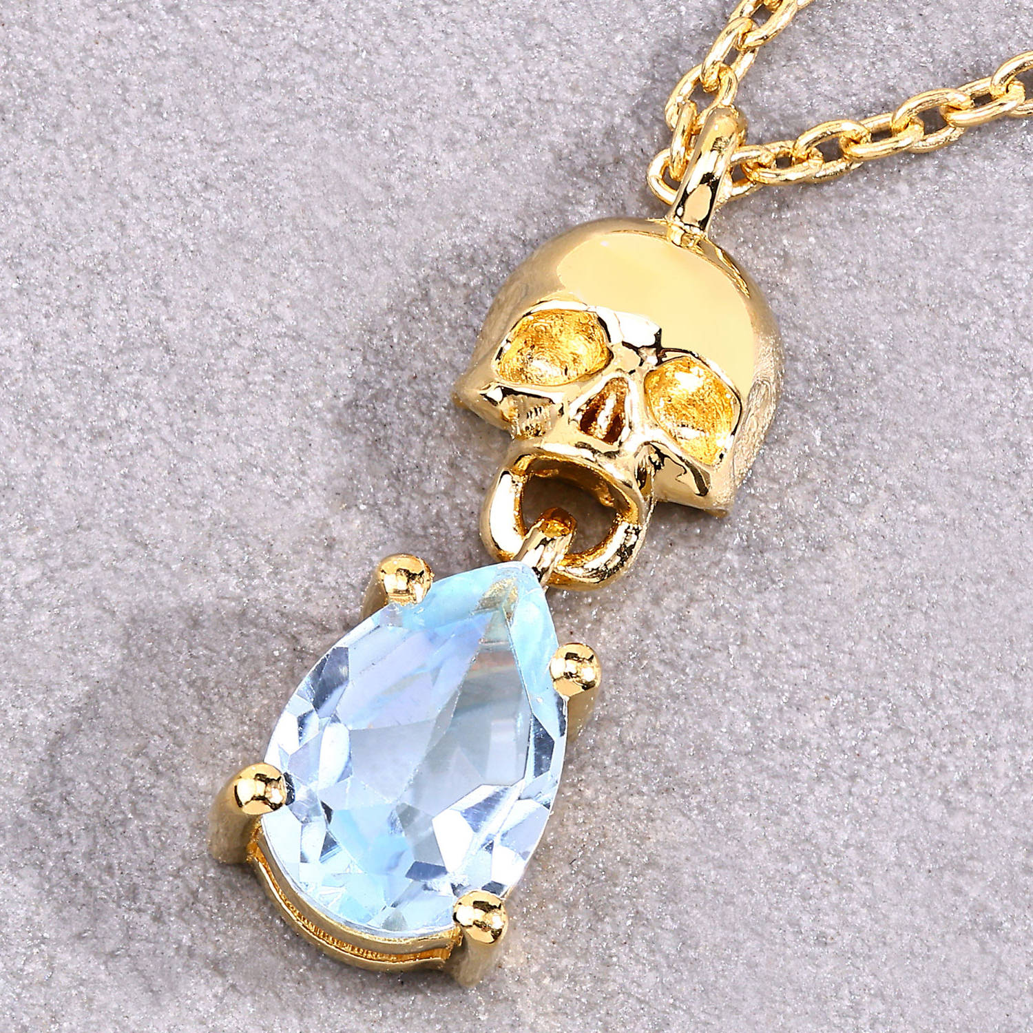 Blue Topaz Skull Pendant 0.84 Carats Gold Plated Silver