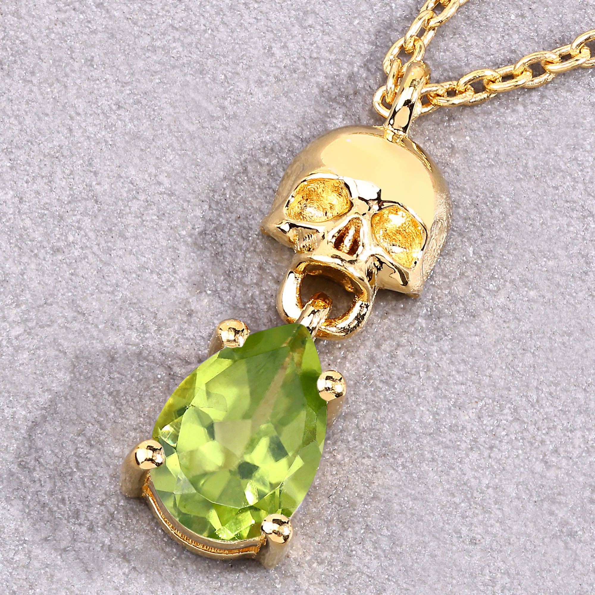 Peridot Skull Pendant 0.74 Carats Gold Plated Silver