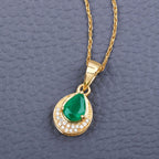 Zambian Emerald Pendant With Diamonds 0.86 Carats 14K Yellow Gold