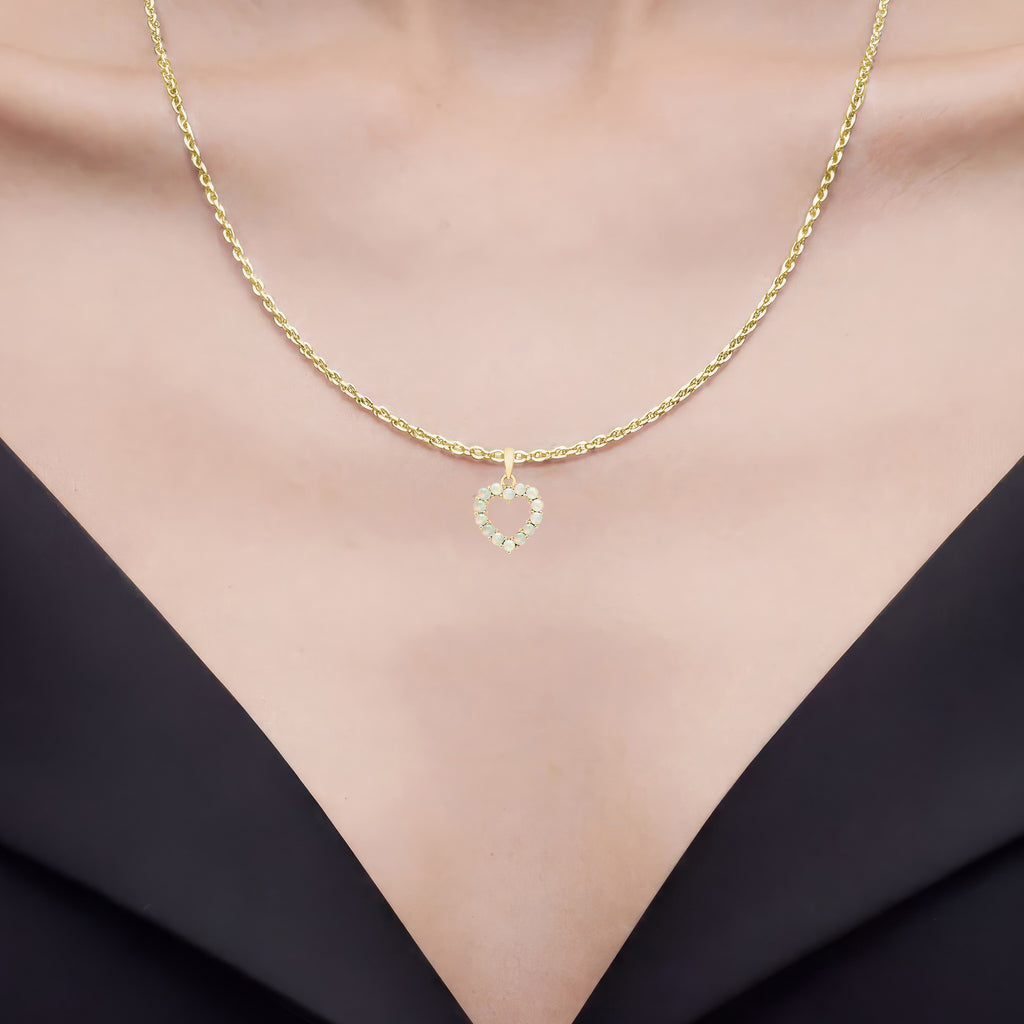 Ethiopian Opal Heart Pendant 0.4 Carats 10K Yellow Gold