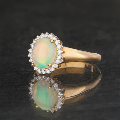 Natural Ethiopian Opal Ring With Diamonds 1.22 Carats 9K Yellow Gold