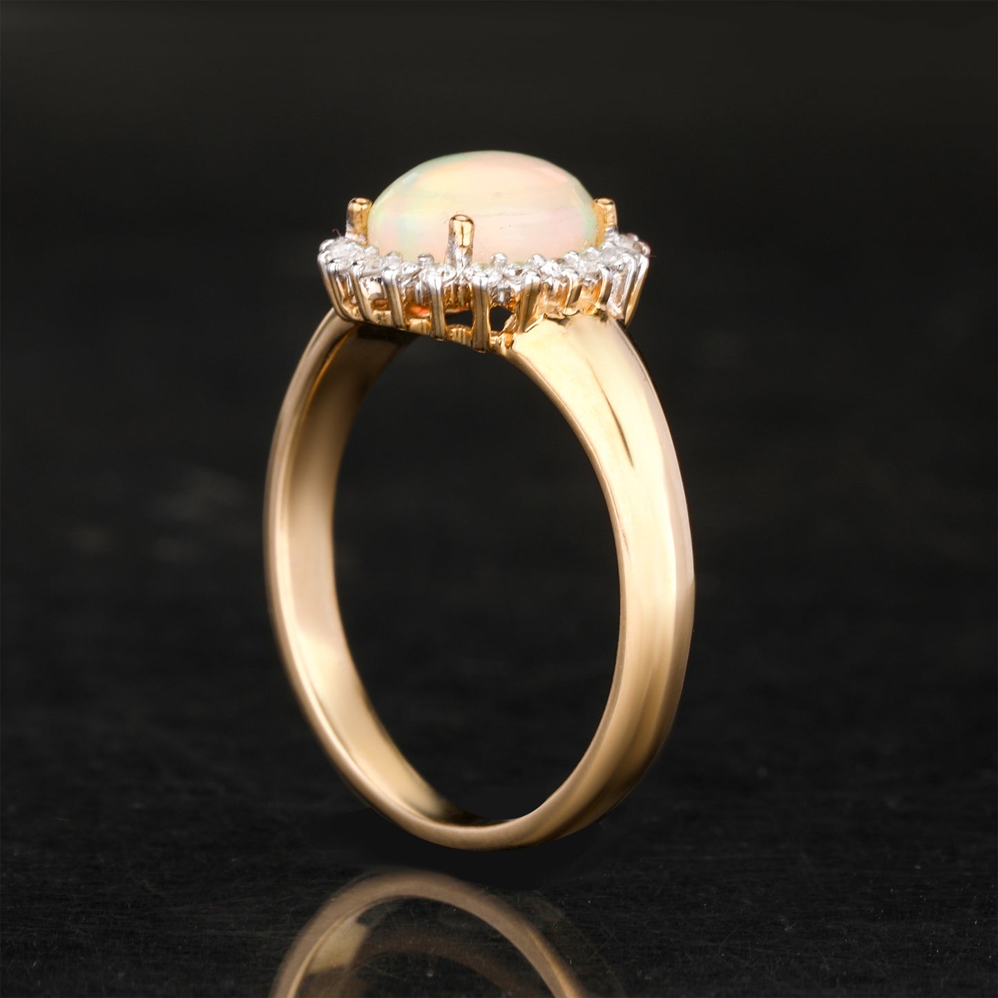 Natural Ethiopian Opal Ring With Diamonds 1.22 Carats 9K Yellow Gold