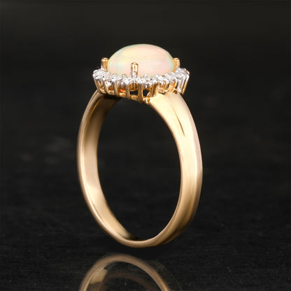 Natural Ethiopian Opal Ring With Diamonds 1.22 Carats 9K Yellow Gold