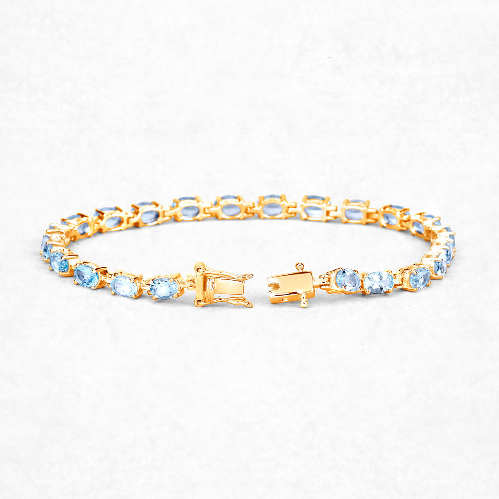 Blue Topaz Tennis Bracelet 11.2 Carats Gold Plated Silver
