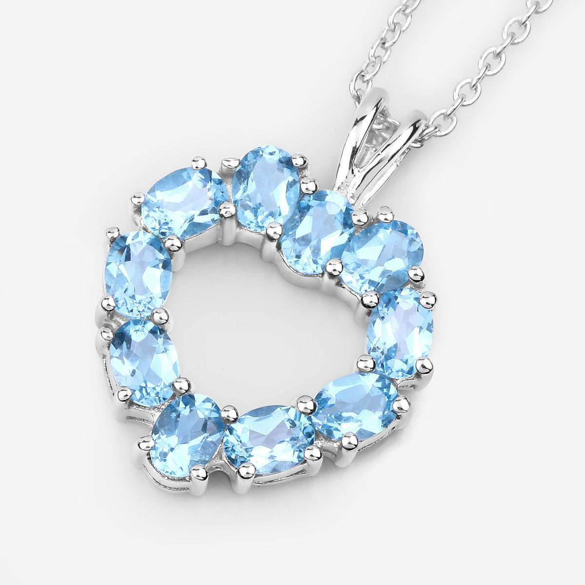 Swiss Blue Topaz Heart Pendant 1.88 Carats Sterling Silver