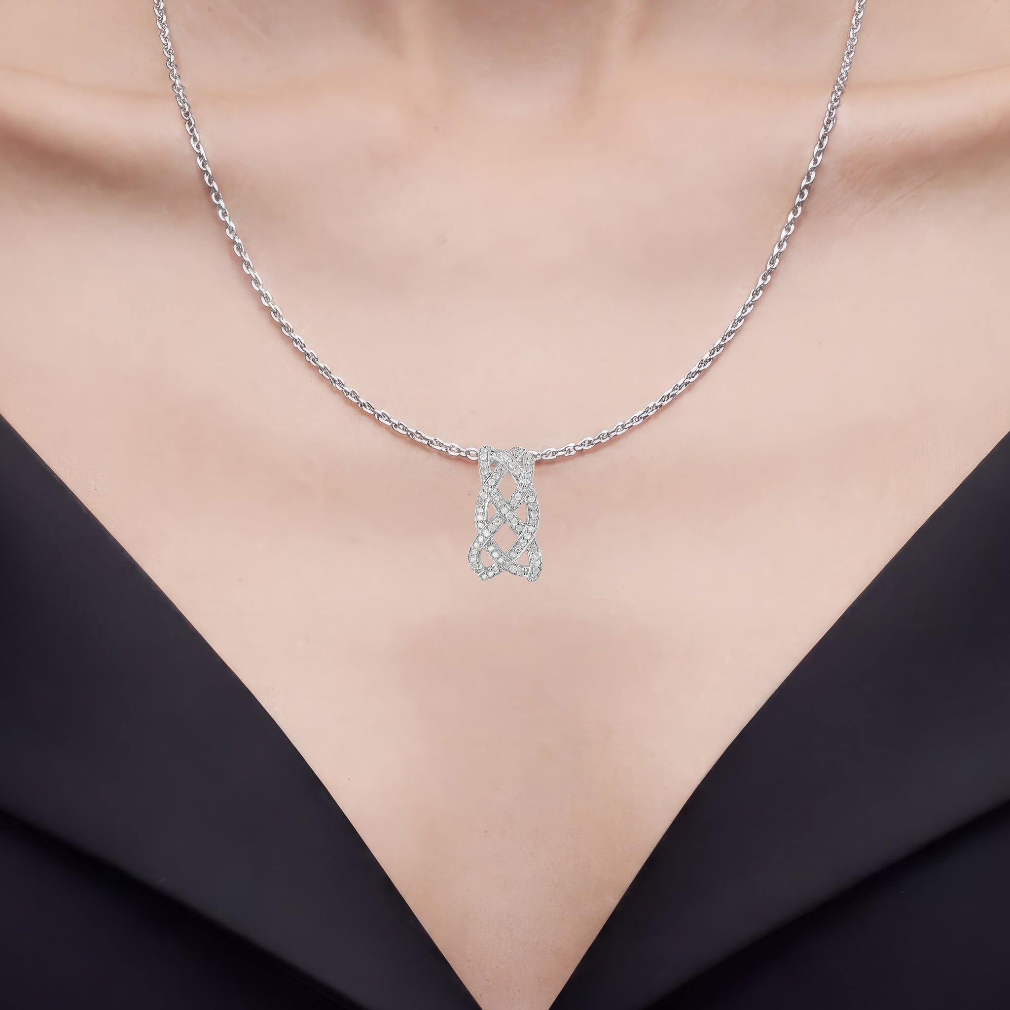 Diamond Infinity Knot Pendant 0.53 Carats Sterling Silver
