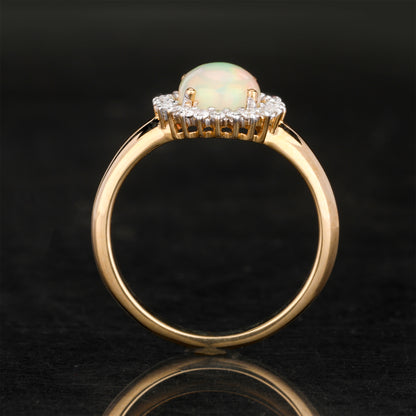 Natural Ethiopian Opal Ring With Diamonds 1.22 Carats 9K Yellow Gold