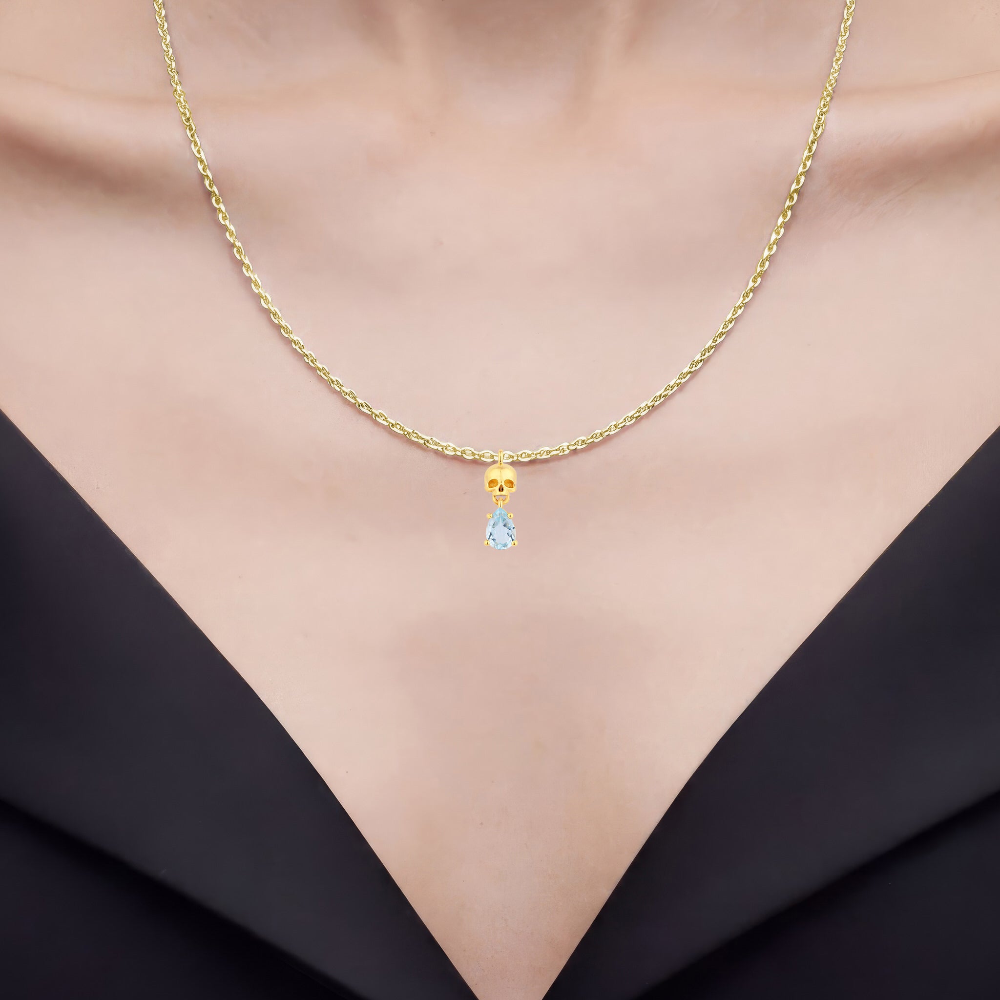 Blue Topaz Skull Pendant 0.84 Carats Gold Plated Silver
