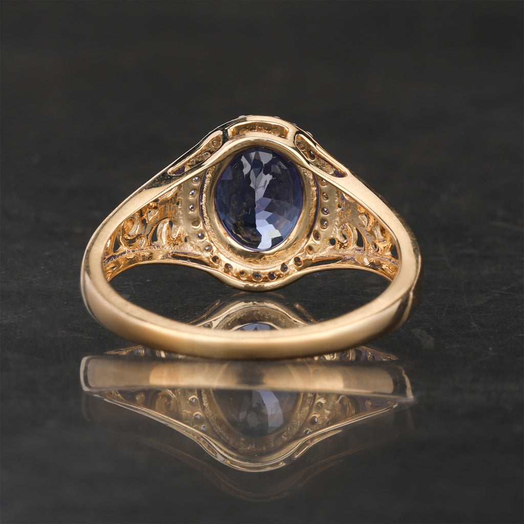 Natural Tanzanite Ring With White Zircon 1.85 Carats 9K Yellow Gold