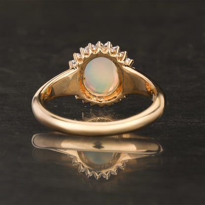 Natural Ethiopian Opal Ring With Diamonds 1.22 Carats 9K Yellow Gold