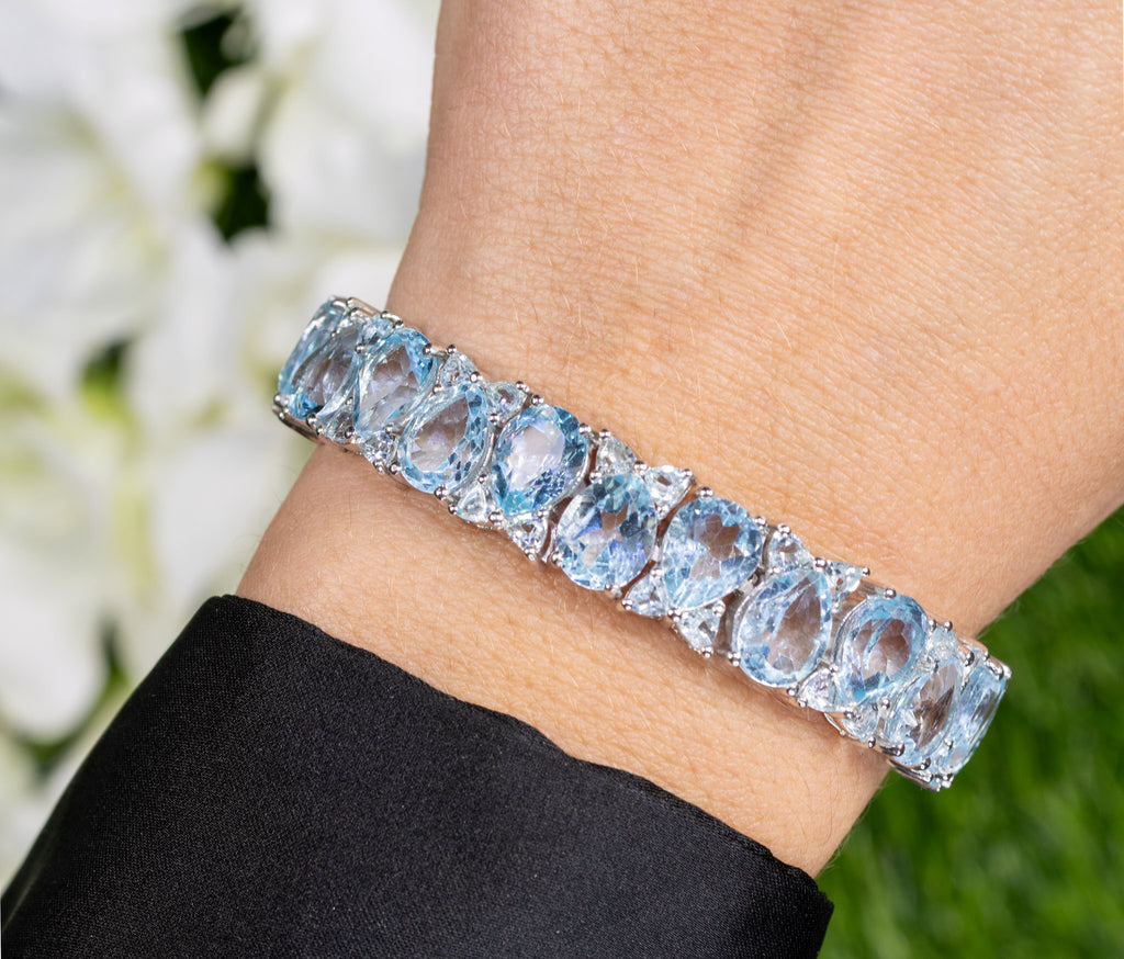 Blue Topaz Tennis Bracelet 58 Carats Rhodium Plated Sterling Silver