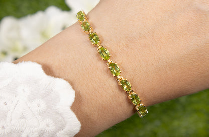 Peridot Tennis Bracelet 8.6 Carats Oval Cut 14K Yellow Gold Plated Silver