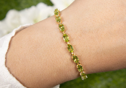 Peridot Tennis Bracelet 8.6 Carats Oval Cut 14K Yellow Gold Plated Silver