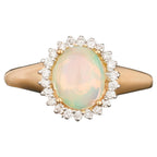 Natural Ethiopian Opal Ring With Diamonds 1.22 Carats 9K Yellow Gold