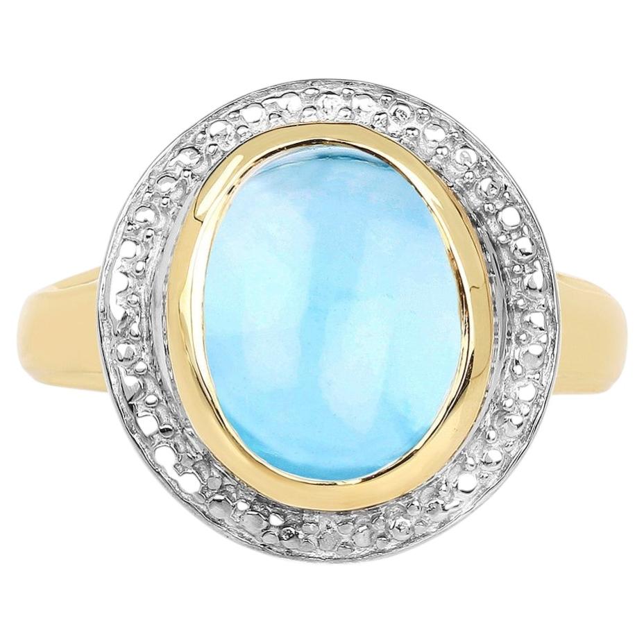 Blue Topaz Ring 6.68 Carats Gold Plated Silver