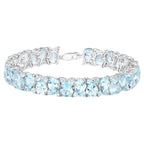 Blue Topaz Tennis Bracelet 58 Carats Rhodium Plated Sterling Silver