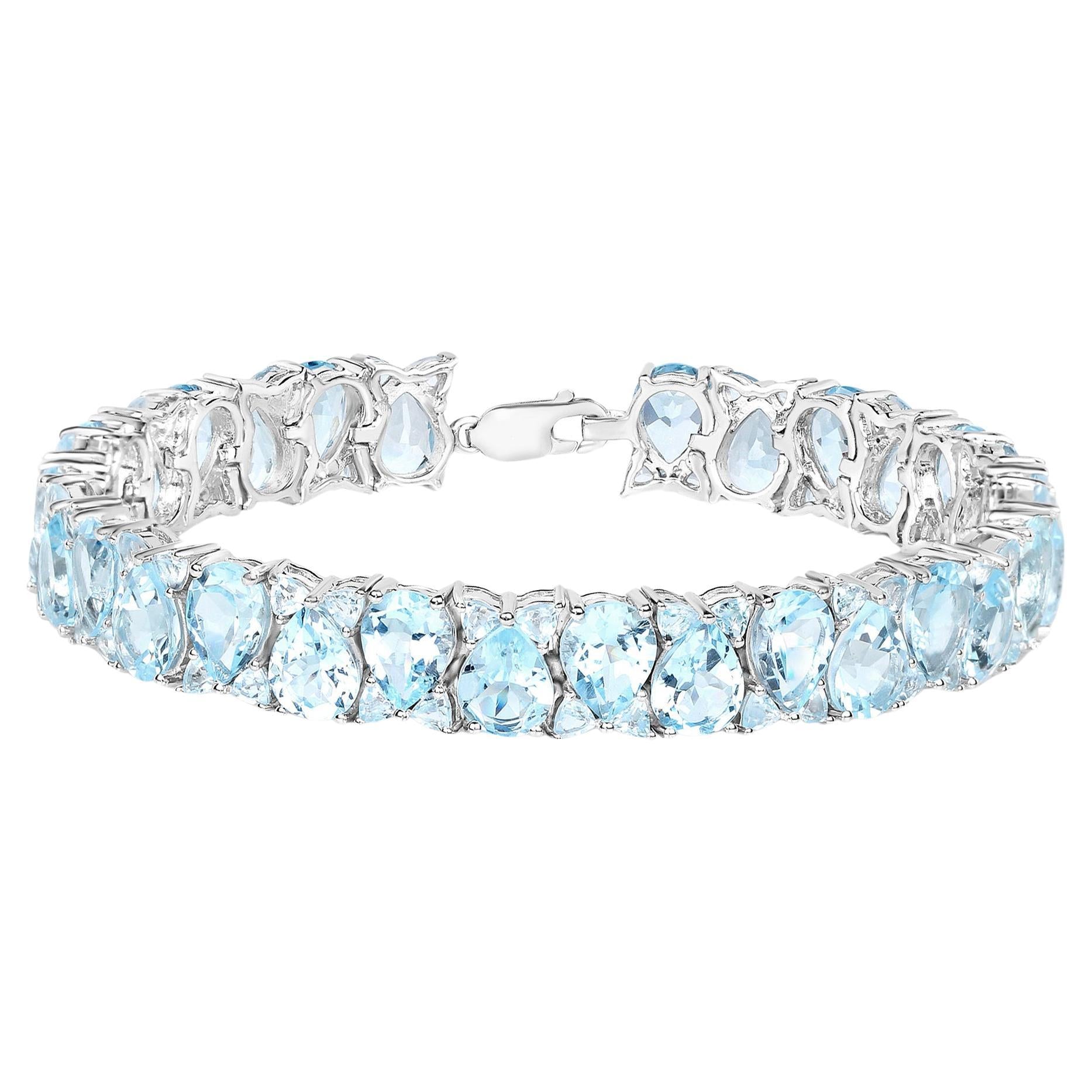Blue Topaz Tennis Bracelet 58 Carats Rhodium Plated Sterling Silver