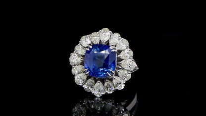 Important Blue Sapphire Ring With Pear Diamond Halo 9.85 Carats 18K Gold