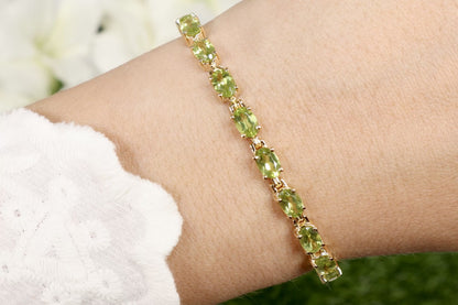 Peridot Tennis Bracelet 8.6 Carats Oval Cut 14K Yellow Gold Plated Silver